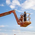 low-angle-shot-of-a-man-working-at-a-construction-2023-11-27-05-30-01-utc